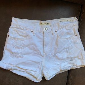 Ripped white shorts